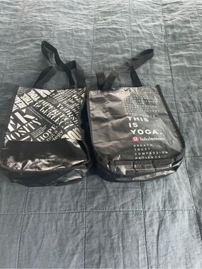 lululemon Black shopping Bags with White Text and Red Logo - 2 for $10.